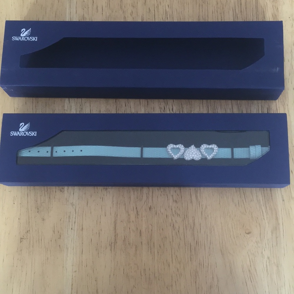Swarovski teal blue leather bracelet with charms.